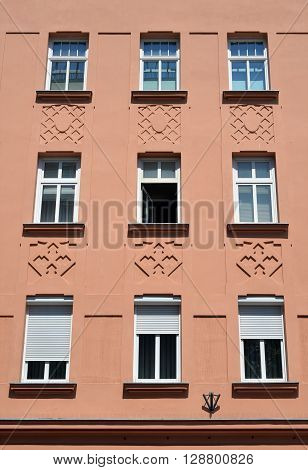 The wall of the city buildings in the center of a European city.