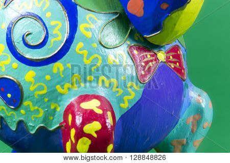 handicraft, craftwork, workmanship, giraffe, camelopard, colorful, colourful, colored, green background
