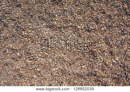 A photo background with different brown stones.