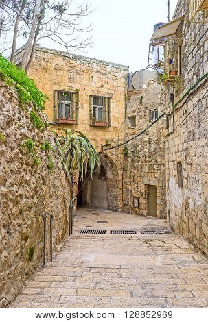 The scenic medieval street in heart of Armenian Quarter of Jerusalem Israel.