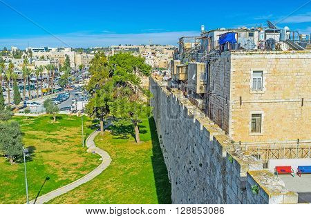 JERUSALEM ISRAEL - FEBRUARY 18 2016: The tiny green Hapninim Garden located between New and Damascus Gates is the nice place to relax and enjoy the weather on February 18 in Jerusalem.