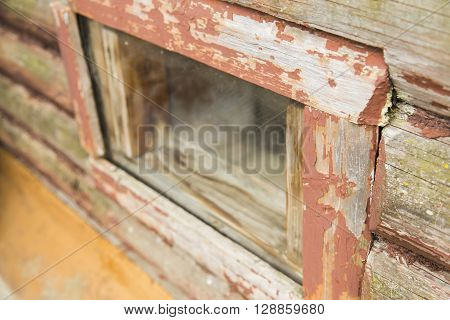 Detail of old window frame made from wood.
