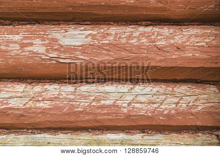 Wooden wall from logs as a background texture