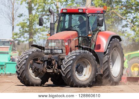 GRIMMEN/ GERMANY - MAY 5: german case puma cvx 150 tractor drives on track on a motortechnic festival on may 5 2016 in grimmen / Germany.