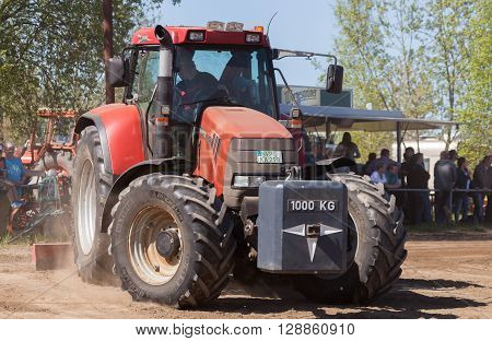 GRIMMEN/ GERMANY - MAY 5: german case puma cvx 150 tractor drives on track on a motortechnic festival on may 5 2016 in grimmen / Germany.