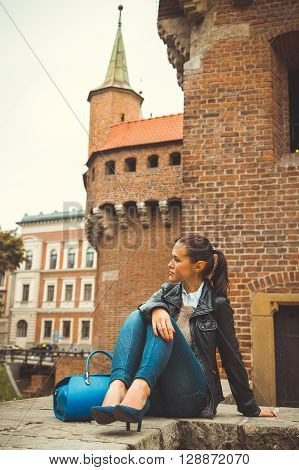 Beautiful girl traveling in the ancient town