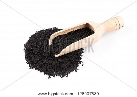Heap Of Black Sesame On Wooden Spoon