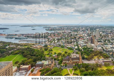 Sydney Australia - November 11 2014: Aerial view of Sydney from Sydney Tower in cloudy weather Sydney New South Wales Australia. Hyde Park and Royal Botanic Garden in the foreground.