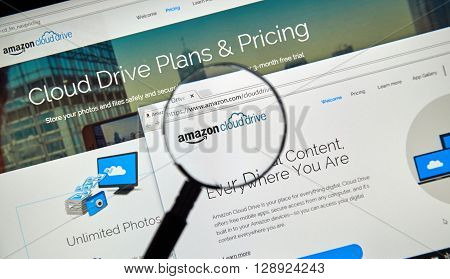 MONTREAL CANADA - MAY 8 2016 : Amazon Cloud Drive web page under magnifying glass. Amazon Cloud Drive is a web storage application from Amazon.