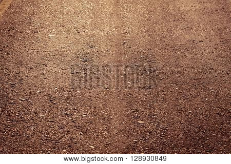 mpty asphalt roadway with sunlight, transport industry