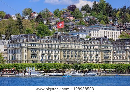 Lucerne, Switzerland - 8 May, 2016: Nationalquai quay, view over Lake Lucerne from the Bahnhofquai quay. Lucerne is a city in central Switzerland, it is the capital of the Swiss Canton of Lucerne and the capital of the district of the same name.