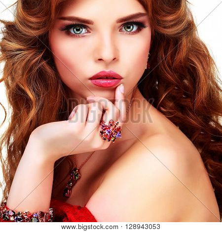 A beautiful young whiteheaded woman is in red clothes, isolated on a white background