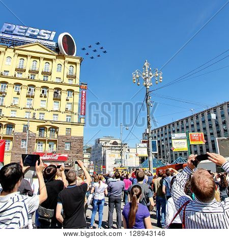 MOSCOW RUSSIAN - MAY 9 2013: Victory parade dedicated to the Soviet victory over Germany. People on the streets of Moscow greeted Pass technique. For editorial use only.