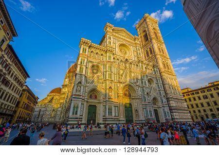 FLORENCE, ITALY - JUNE 12, 2015: Santa Maria del Fiore, name of Florence cathedral, front of this building. Half shadow and half sun
