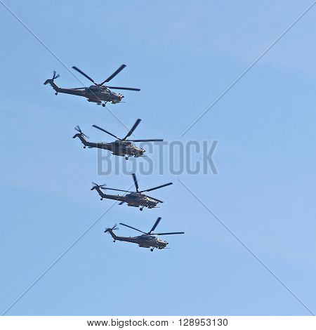MOSCOW RUSSIAN - MAY 9 2013: Demonstration flight of military helicopters a parade dedicated to the Soviet victory over Germany. For editorial use only.