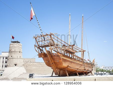 Dubai ,UAE - April 6 2016 : Historical museum in Dubai United Arab Emirates. Arabic Dhow in Dubai historical museum.
