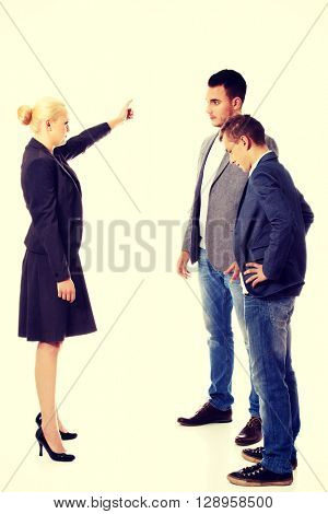 Boss businesswoman screaming at her employees