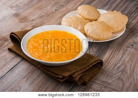 Aamras or Aam Ras Puri: Puri which is an indian fried small bread and alphonso mango pulp is a popular lunch especially during Padwa, the Marathi new year, maharashtrian lunch/dinner menu