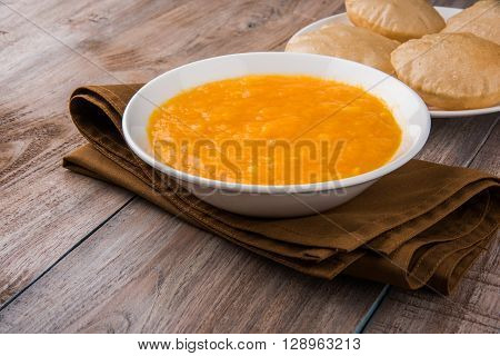 Aamras or Aam Ras Puri: Puri which is an indian fried small bread and alphonso mango pulp is a popular lunch especially during Padwa, the Marathi new year, maharashtrian lunch/dinner menu