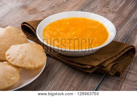 Aamras or Aam Ras Puri: Puri which is an indian fried small bread and alphonso mango pulp is a popular lunch especially during Padwa, the Marathi new year, maharashtrian lunch/dinner menu