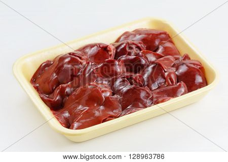 Fresh raw chicken liver in disposable packaging. Cooking food.