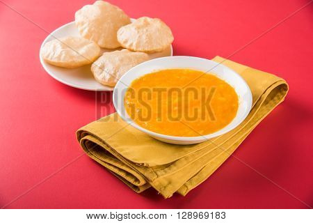 Aamras or Aam Ras Puri: Puri which is an indian fried small bread and alphonso mango pulp is a popular lunch especially during Padwa, the Marathi new year, maharashtrian lunch/dinner menu