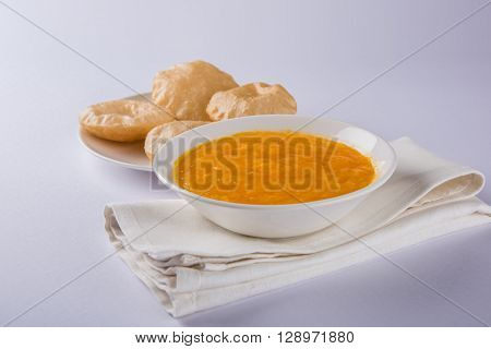 Aamras or Aam Ras Puri: Puri which is an indian fried small bread and alphonso mango pulp is a popular lunch especially during Padwa, the Marathi new year, maharashtrian lunch/dinner menu