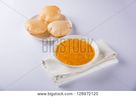 Aamras or Aam Ras Puri: Puri which is an indian fried small bread and alphonso mango pulp is a popular lunch especially during Padwa, the Marathi new year, maharashtrian lunch/dinner menu