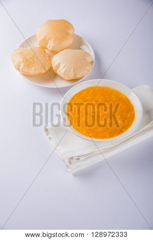 Aamras or Aam Ras Puri: Puri which is an indian fried small bread and alphonso mango pulp is a popular lunch especially during Padwa, the Marathi new year, maharashtrian lunch/dinner menu