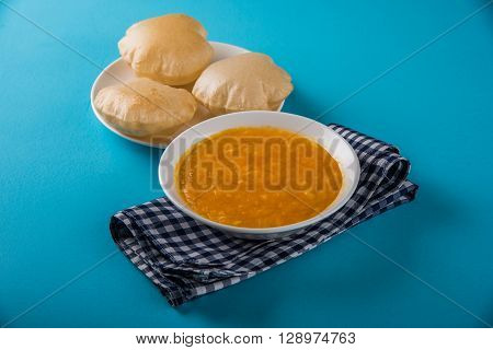 Aamras or Aam Ras Puri: Puri which is an indian fried small bread and alphonso mango pulp is a popular lunch especially during Padwa, the Marathi new year, maharashtrian lunch/dinner menu