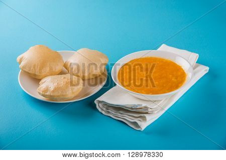 Aamras or Aam Ras Puri: Puri which is an indian fried small bread and alphonso mango pulp is a popular lunch especially during Padwa, the Marathi new year, maharashtrian lunch/dinner menu