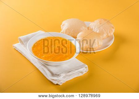 Aamras or Aam Ras Puri: Puri which is an indian fried small bread and alphonso mango pulp is a popular lunch especially during Padwa, the Marathi new year, maharashtrian lunch/dinner menu