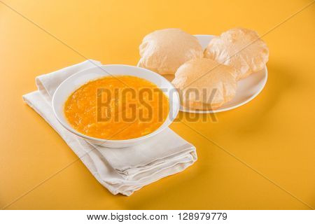 Aamras or Aam Ras Puri: Puri which is an indian fried small bread and alphonso mango pulp is a popular lunch especially during Padwa, the Marathi new year, maharashtrian lunch/dinner menu