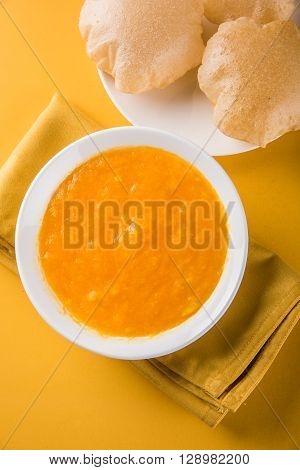 Aamras or Aam Ras Puri: Puri which is an indian fried small bread and alphonso mango pulp is a popular lunch especially during Padwa, the Marathi new year, maharashtrian lunch/dinner menu