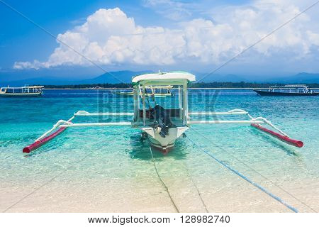 traditional Indonesia boat Jukung on a tropical beah