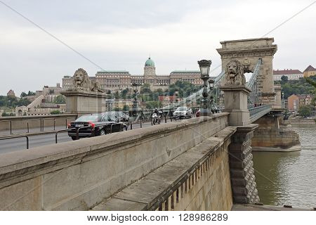 BUDAPEST HUNGARY - JULY 13: Chain Bridge in Budapest on JULY 13 2015. The Szechenyi Suspension Bridge That Spans the River Danube Between Buda and Pest in Budapest Hungary.