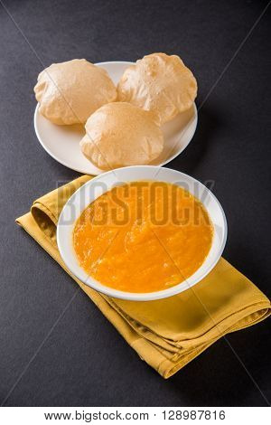 Aamras or Aam Ras Puri: Puri which is an indian fried small bread and alphonso mango pulp is a popular lunch especially during Padwa, the Marathi new year, maharashtrian lunch/dinner menu