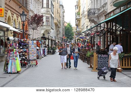 BUDAPEST HUNGARY - JULY 13: Tourists Walking at Vaci Street in Budapest on JULY 13 2015. People Walking at Vaci Street Reserved For Pedestrians in Downtown Budapest Hungary.