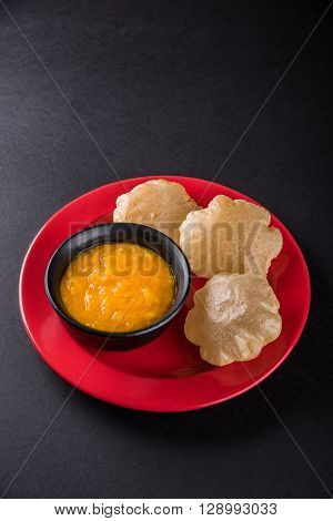 Aamras or Aam Ras Puri: Puri which is an indian fried small bread and alphonso mango pulp is a popular lunch especially during Padwa, the Marathi new year, maharashtrian lunch/dinner menu