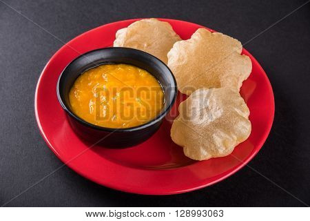 Aamras or Aam Ras Puri: Puri which is an indian fried small bread and alphonso mango pulp is a popular lunch especially during Padwa, the Marathi new year, maharashtrian lunch/dinner menu