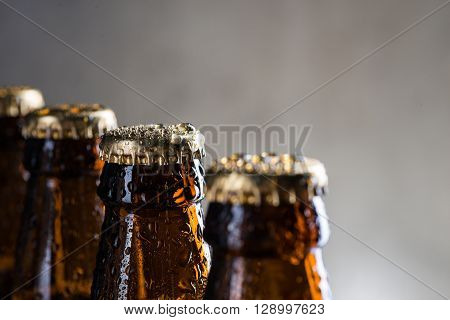 Ice Cold Beer Bottles With Drops Of Dew