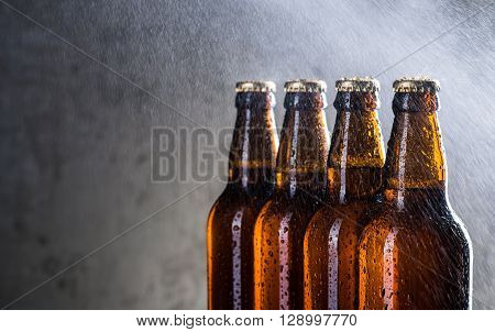 Ice Cold Beer Bottles With Drops Of Dew