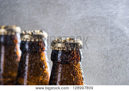 Ice Cold Beer Bottles With Drops Of Dew