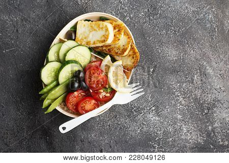 Containers For The Preparation Of Healthy Food With Brown Rice, Fried Cheese Halumi, Tomatoes, Cucum