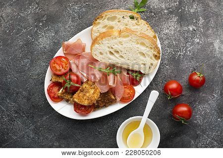 Halloumi Cheese With Bruschetta, Tomatoes, Prosciutto, Honey, Pine Nuts. Healthy Snack Top View