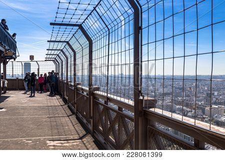 Paris, France - March 30, 2017: Top of the Eiffel Tower. This is the top floor observation deck at the Eiffel Tower in Paris