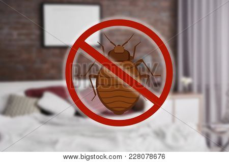 Stop bug sign and clean bed in room