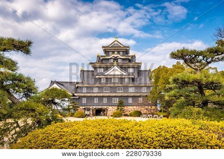 Okayama, Japan at Okayama Castle. (sign reads: 
