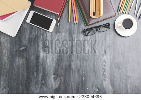 Top View Of Modern Wooden Desk With Copy Space And Various Items. Work Place And Style Concept