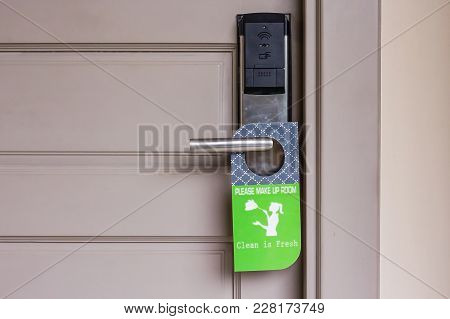 Closed Door Of Hotel Room With Please Make Up Room Sign Hang On Door Knob